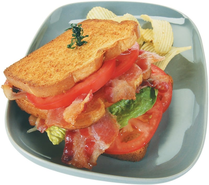 BLT with Side of Chips on Blue Plate Food Picture