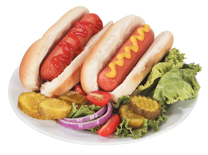 Plate of Fresh Beef Hot Dogs with Pickles and Onions Food Picture