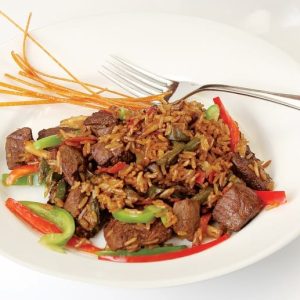 Beef Stir Fry in White Dish with Fork Food Picture