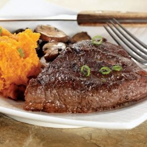 Beef Triple Tip on a Plate with Mashed Sweet Potatoes Food Picture