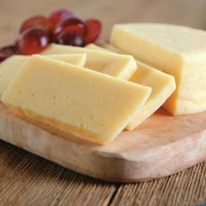 Gouda Cheese on Wooden Board Food Picture