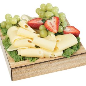 Jarlsberg Cheese with Garnish on Wooden Block Food Picture