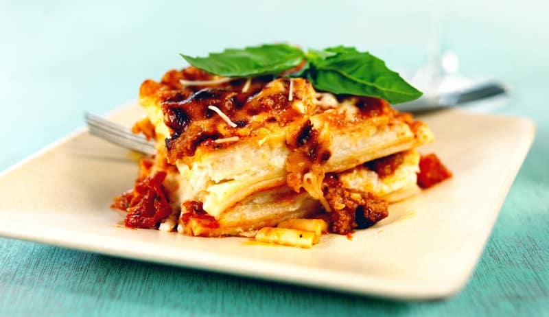 Traditional Lasagna with Basil Garnish Food Picture