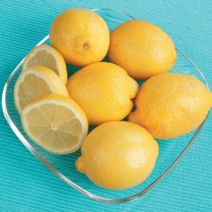 Bowl of Lemons and Slices Food Picture