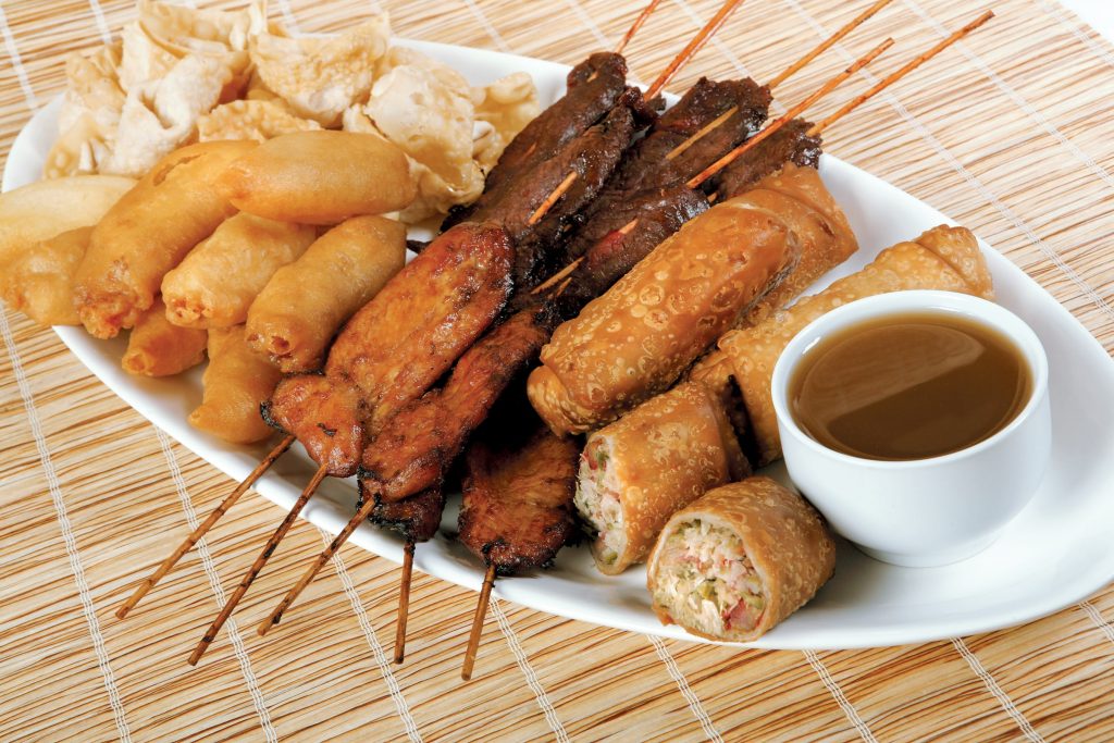 PuPu Platter on White Plate with Dipping Sauce Food Picture