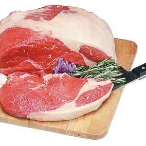 Boneless Raw Beef Rib Roast on Wooden Board with Knife Food Picture