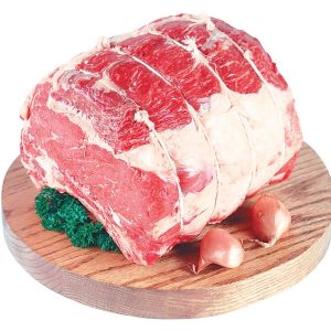 Boneless Raw Beef Rib Roast on Round Wooden Board Food Picture