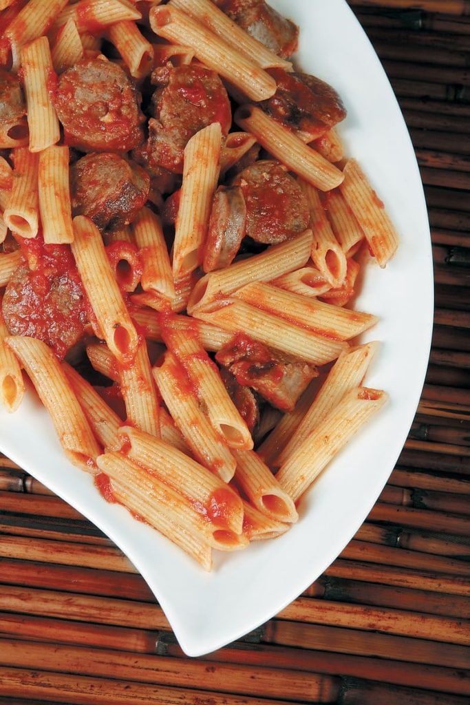 Sausage and Pasta in Sauce on White Dish Food Picture